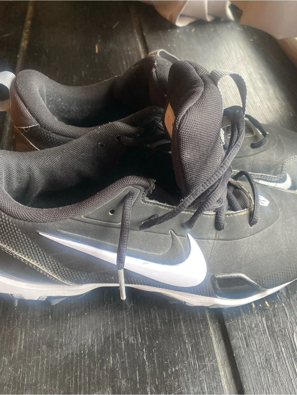 Nike Men’s Black Athletic Cleats with White Swoosh sports cleats